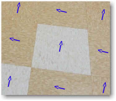 VCT is commnly installed by alternating the direction of each tile to make each tile stand out. Homefloorguide.com 